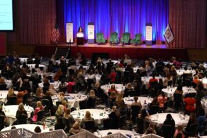 image of speaker and audience at the WV Chamber of Commerce's 2023 Annual Women's Summit